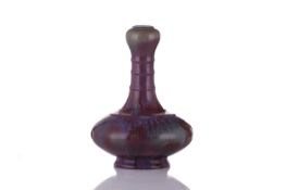A Chinese flambe glaze suantouping vase, possibly 18th century, the neck with three raised bands abo