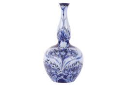 William Moorcroft for James Macintyre & Co, a large Florian Ware vase in the Poppy pattern, of b