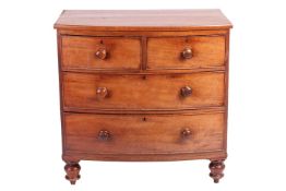 A Victorian mahogany bow-front chest, two short drawers over two graduated long drawers, resting on 