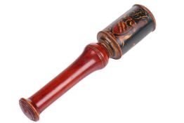 A George III turned and painted boxwood tipstaff with a drum top bearing Royal coat of arms, armoria