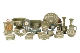 A large collection of Wedgwood sage green jasperware, comprising ornaments, dishes, vases, candlesti