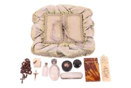 A George III silver and mother-of-pearl toothpick case, a blonde tortoiseshell calling card case, an