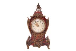 An early 20th century, Louis XV style red Boulle balloon clock. with gilt metal mounts, 15 cm wide x