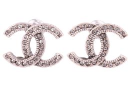A pair of double C stud earrings, interlocking C motifs set with CZs, peg and butterfly fittings, ov