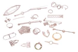 A collection of broken jewellery items, ring mounts, brooch mounts and other items, in bi-colour met