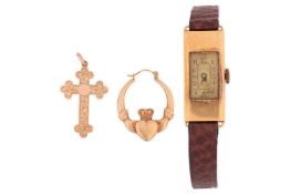 A single Claddagh hoop earring in 9ct gold; an Invincta manual wind wristwatch on leather strap, in 