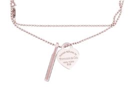 Tiffany & Co. - a '1837 makers' bar pendant and a 'Return to Tiffany' heart pendant, on silver b