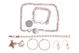 Tiffany & Co. - a 'Return to Tiffany' oval tag necklace, measuring approximately 38cm, a 'Return