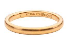 A 22ct gold wedding band, the court-shaped band measuring approximately 2.2mm wide, hallmarked Birmi