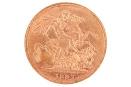 A Victorian 1887 sovereign, St George and the dragon to the reverse.