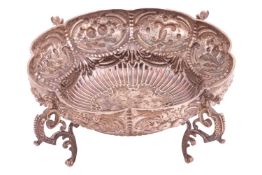 A late Victorian silver lobed circular fruit bowl, London 1898, maker unidentified but retailed by G