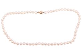 A cultured pearl necklace, the pearls of cream body with pink overtones, measuring approximately 6.5