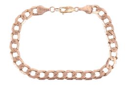 A flat curb link bracelet in 9ct gold, completed with lobster clasp, British convention marks, 23.5 
