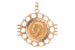 A 1926 George V half-sovereign, mounted in a cablework surround, length 4cm, diameter 3.5cm, gross w