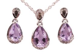 An amethyst and diamond-set pendant and earring suite, featuring pear-cut amethysts accented with ro