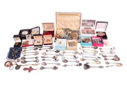 A collection of jewellery items including several costume brooches, earrings, pendants, a pearl neck