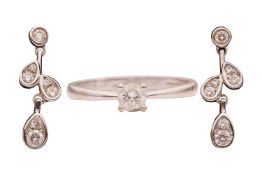 A diamond solitaire ring, claw-set with a round brilliant diamond, with an estimated carat weight of