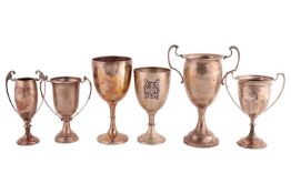 A quantity of silver trophy cups of Rowing interest comprising a two-handled cup awarded to 