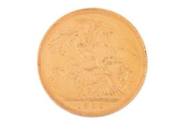A 1900 Queen Victoria full sovereign, obverse with veiled head to the left, in a base metal sovereig