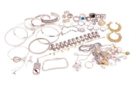 A collection of jewellery items including a bangle by Bruce Morgan, several additional bangles, mark