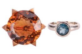 A mid-century citrine brooch, the round citrine set in an angular claw-set mount, measuring approxim