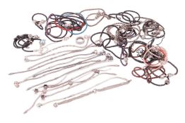 A collection of branded jewellery items including a Pandora ring, Pandora bracelets with attached ch