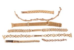 A collection of seven broken yellow metal chains, each stamped 9ct or with UK hallmarks, gross weigh