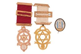 A 19th century enamel Masonic brooch, the oval depicting a square and compass, and a Volume of the S