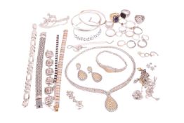 A collection of jewellery items including a Georg Jensen bangle, No. 440, a large curb link bracelet