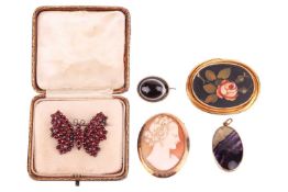 Five gem-set brooches; consisting of a shell cameo brooch in 9ct gold; a Blue John pendant in 9ct go