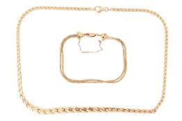 A tapered curb link necklace with lobster clasp, in yellow metal marked '14K Italy', 44.0 cm long; a