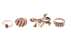 A collection of jewellery items comprising a 9ct gold interwoven-style ring, an enamel bombe-style r