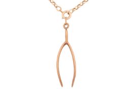 A 9ct gold wishbone pendant on chain, realistically modelled measuring 5.7 cm drop, on a belcher lin