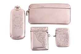 A silver card case of elongated octagonal form, slightly curved profile to fit in waistcoat pocket, 