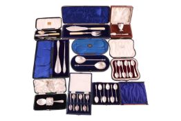 A quantity of mixed cased flatware, including a pair of Edwardian seal top serving spoons, Sheffield