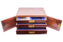 An Edwardian mahogany three-drawer canteen with inset brass handles, containing a silver plated Old 