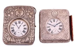 An eight-day Goliath pocket watch in silver travelling case; the white enamel dial with Roman numera