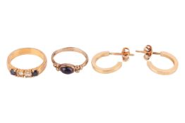 Two gem-set rings and a pair of hoop earrings; to include an iolite dress ring in 9ct gold, oval cab