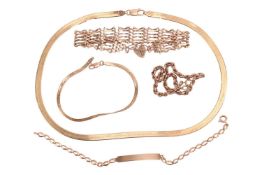 A small collection of jewellery items comprising a 9ct gold gate bracelet with heart padlock, a 9ct 