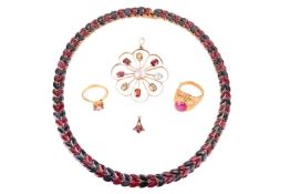 A necklace, two pendants and two rings; a collar necklace set with alternating marquise-cut sapphire