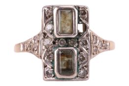 An Art Deco style panel ring, the rectangular head collet-set with two emerald-cut beryls, surround 