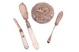 A Burmese silver pumpkin form betel nut box, silver folding fruit knife, butter curl and one other.