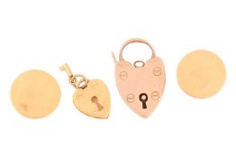 A heart-shaped padlock charm with key, in yellow metal testing as 18ct, stamped with Chinese artisan