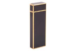 Must de Cartier - a lighter of rectangular body with a canted corner, black lacquered panels with go
