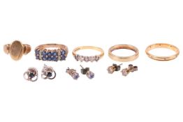 A collection of jewellery items comprising a sapphire and diamond-set ring, in yellow metal marked '