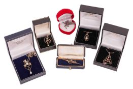 Four Edwardian and similarly styled gem-set pendants and two brooches; to include a scrolled mount w