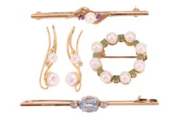 Three gem-set brooches and a pair of gilt earrings; the first brooch of wreath design, alternating w