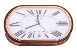 Cartier - a faux tortoise shell quartz alarm clock Model: 7531 Serial: 08320 Case Material: Enameled