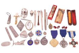 A mixed collection of silver items and other jewellery items; to include a pressed amber cigarette h