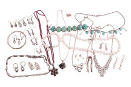 A mixed aggregate of jewellery items; to include examples of a fringe necklace set with turquoise ca